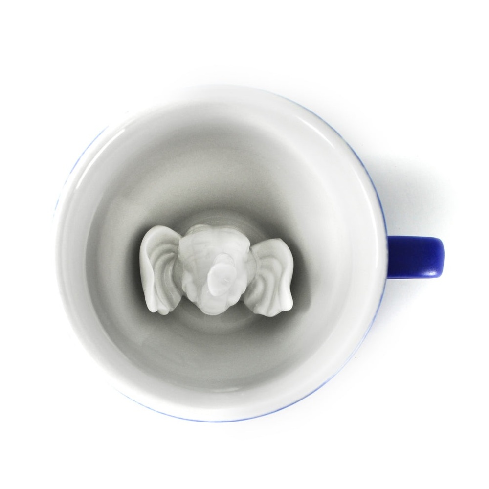 CREATURE CUPS
White Elephant Inside Blue Mug collectible